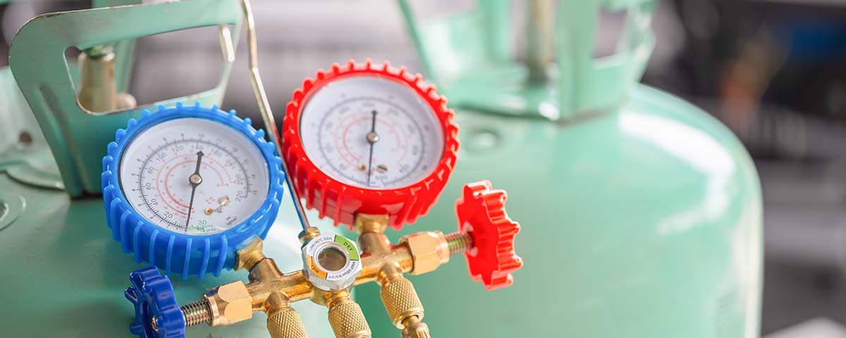 5 Warning Signs Your Air Conditioner is Low on Refrigerant adding refrigerant to air conditioner